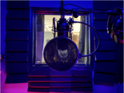 Studio microphone, pop filter, and headphones for audiobook and voice-over recording